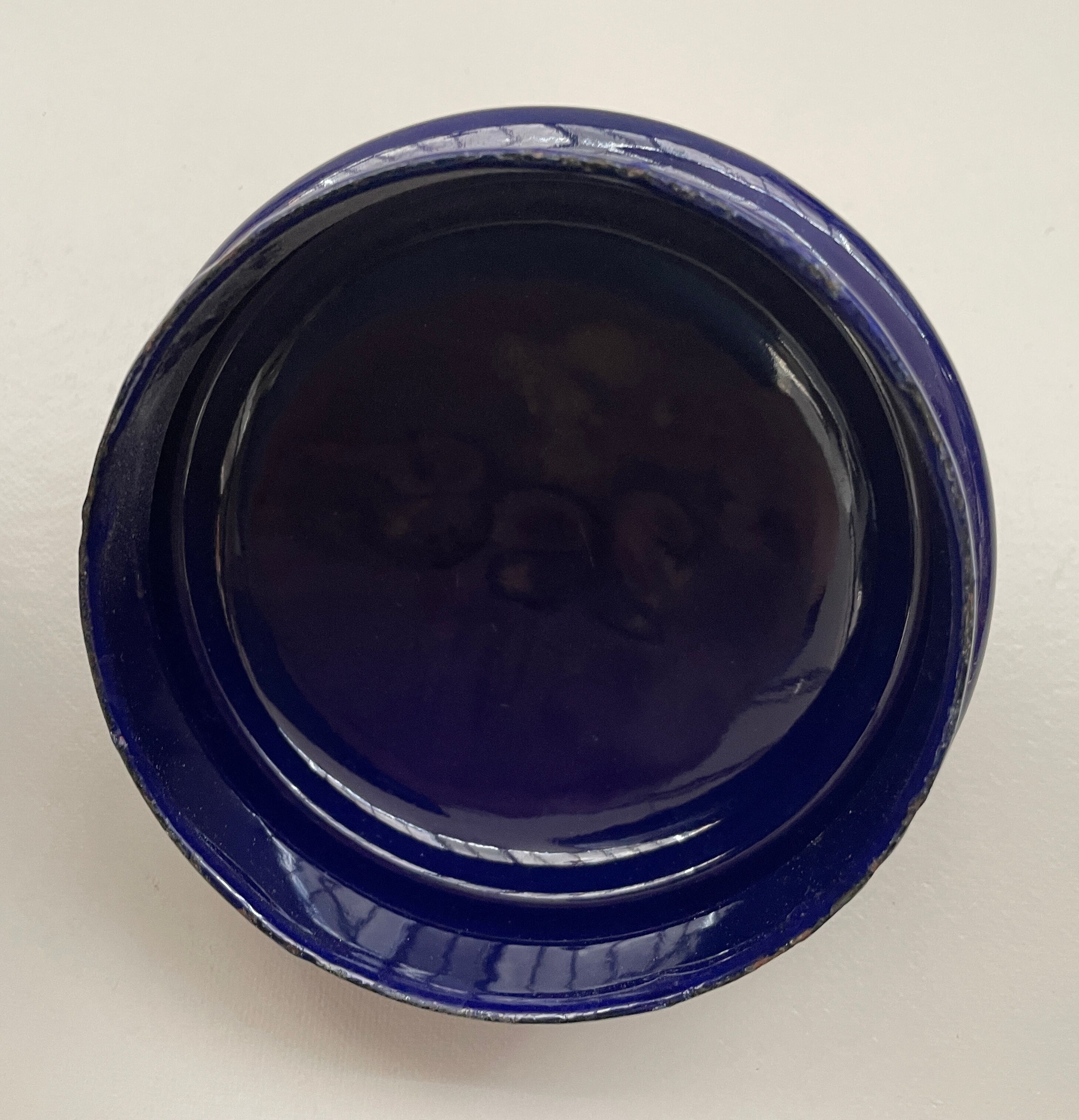 Blue enamelled milk jug