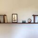 Varnished wooden wall shelf, 1960s