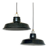 Pair of black and white industrial pendant lights with ceramic sockets