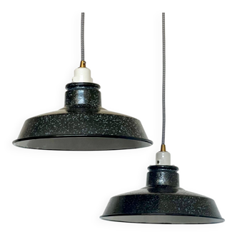 Pair of black and white industrial pendant lights with ceramic sockets