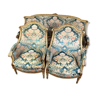 Salon Louis XVI en bois laqué et doré (1 banquette et 2 bergères)