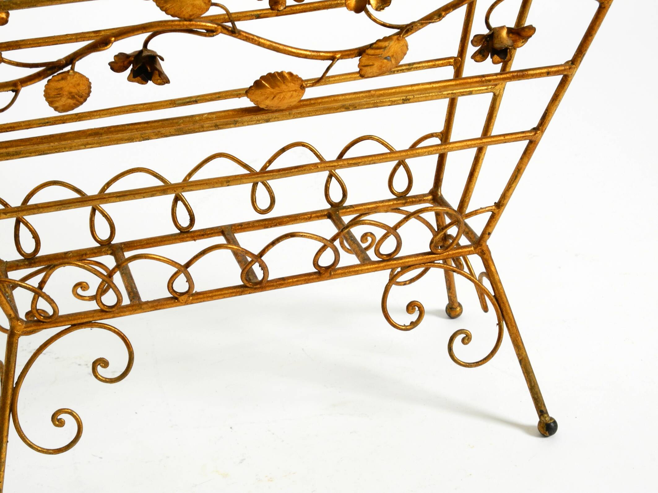 Extraordinary mid-century newspaper and magazine rack with a gilded metal