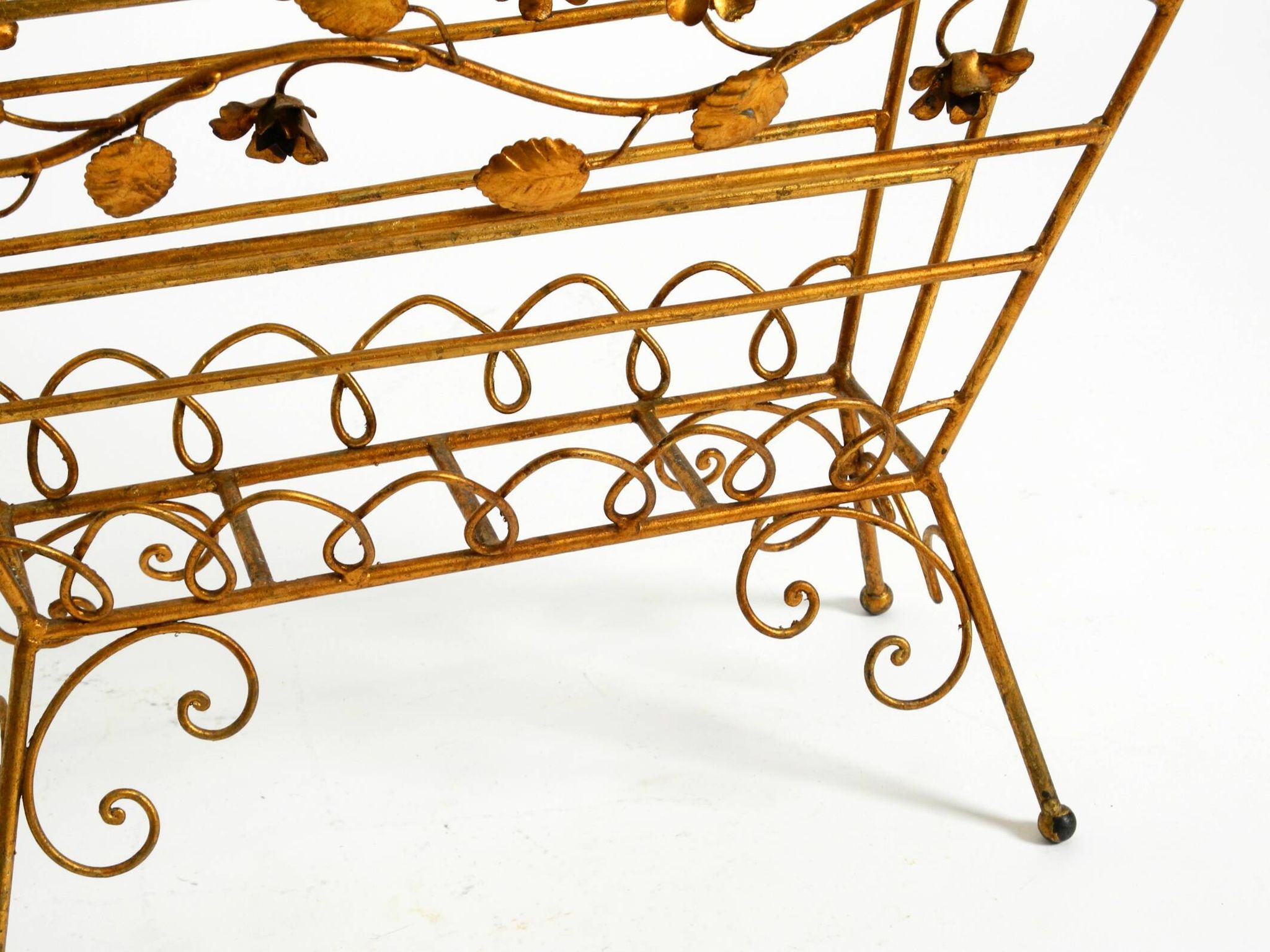 Extraordinary mid-century newspaper and magazine rack with a gilded metal