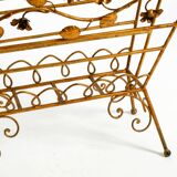 Extraordinary mid-century newspaper and magazine rack with a gilded metal