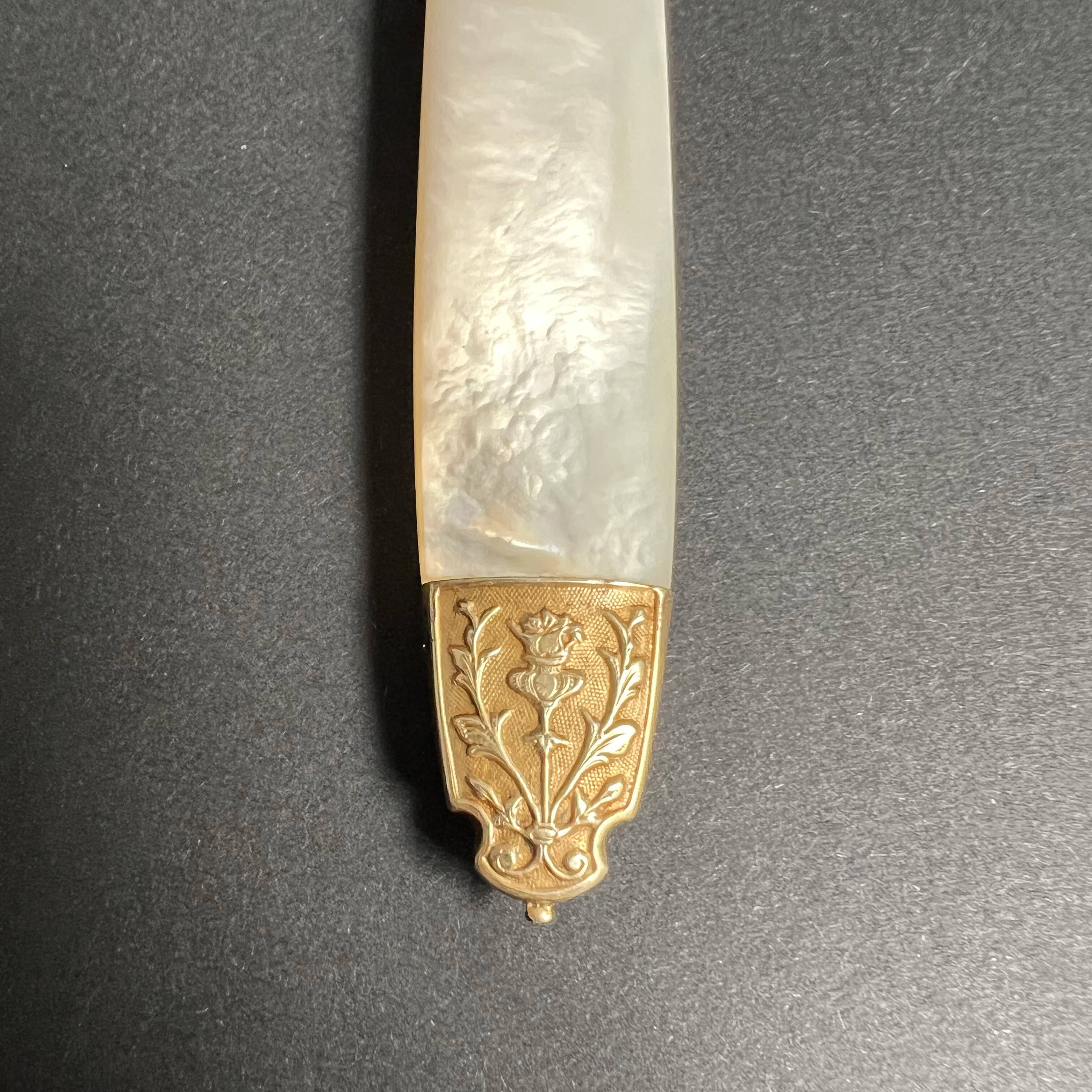 10 Fruit knives in solid silver and vermeil mother-of-pearl