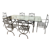 Table and chair set made of solid wrought iron metal.