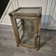 Brown weathered wooden display cabinet with 2 glass shelves.