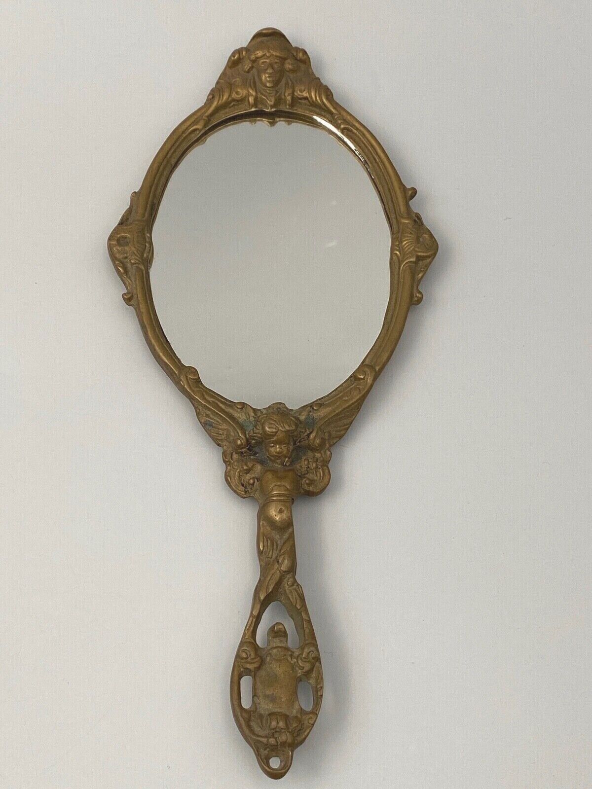 Bronze hand face of the middle XXe decor d'angelot