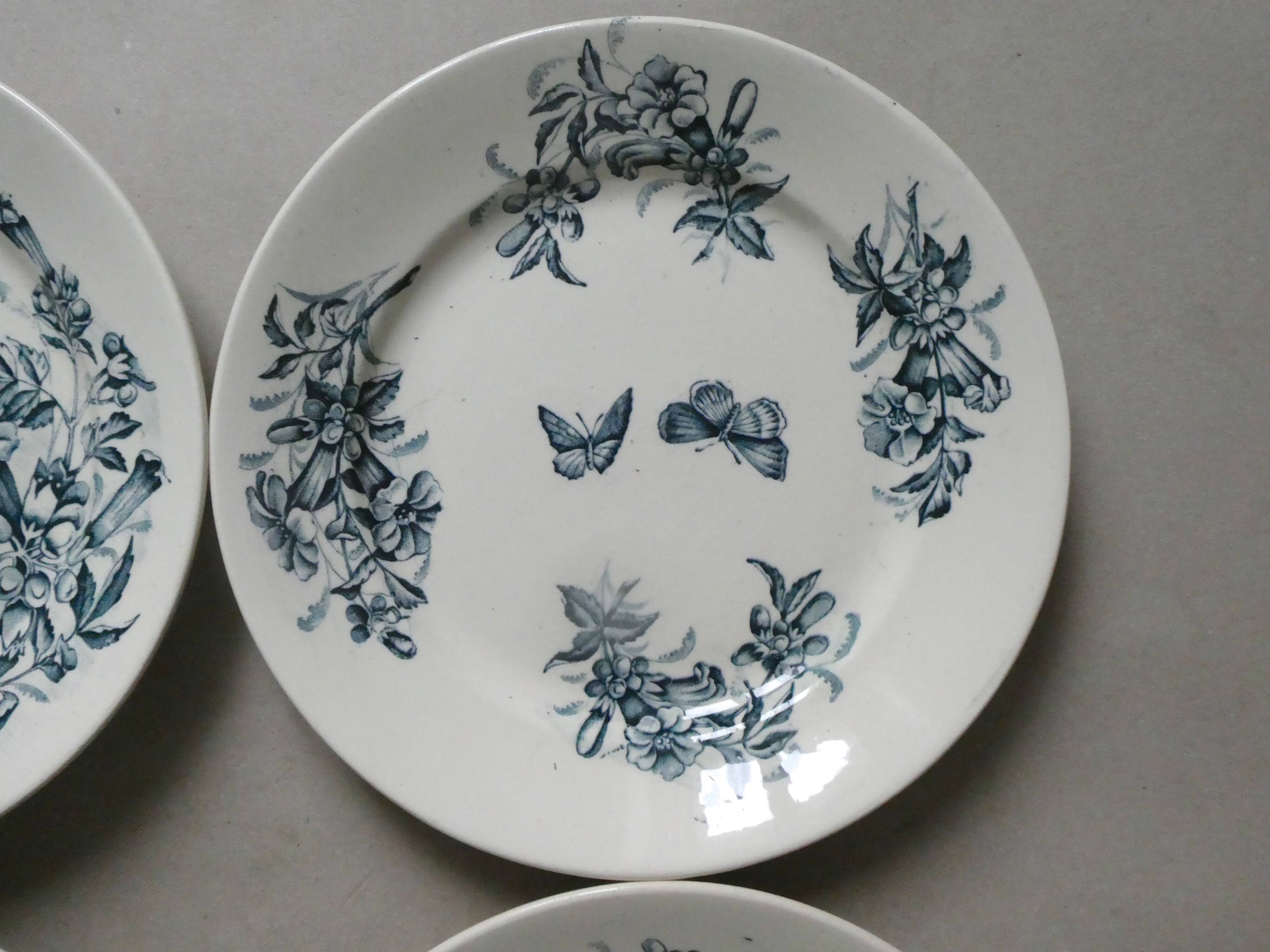 6 assiettes plates Badonviller, papillons et fleurs, 1900