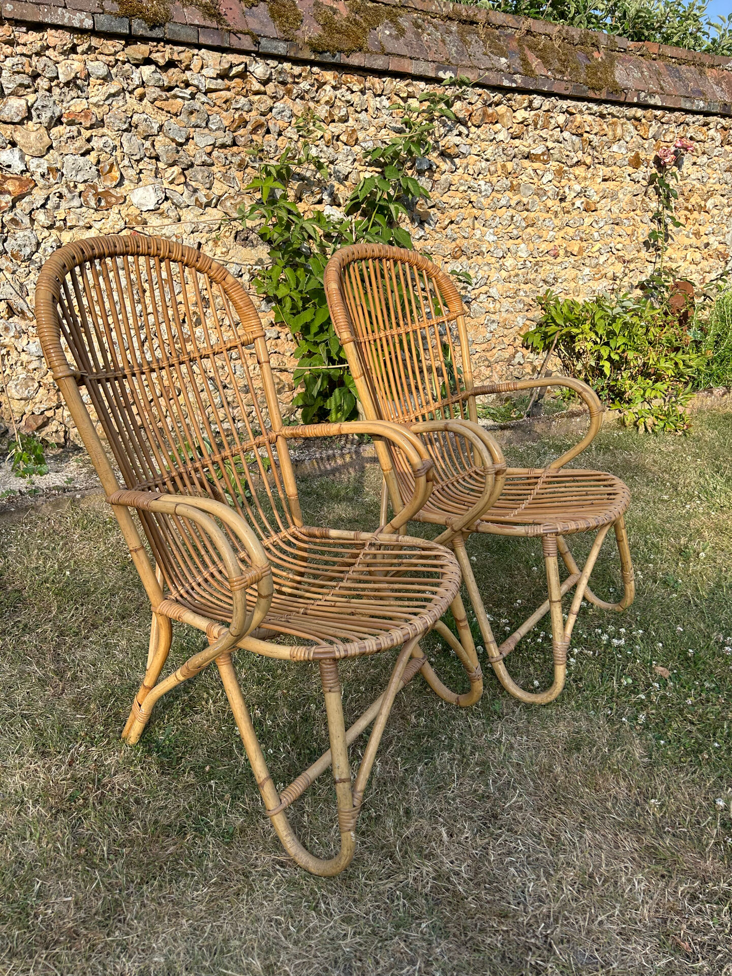 Pair of vintage rattan armchairs from the 1960s.