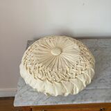 Cushion in beige fabric