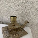 Cellar rat candlestick in gilded brass chised flower pattern, foliage and old face