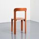 Rey chairs in stained red beech by Bruno Rey