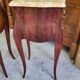 Pair of rosewood bedside tables with marble top