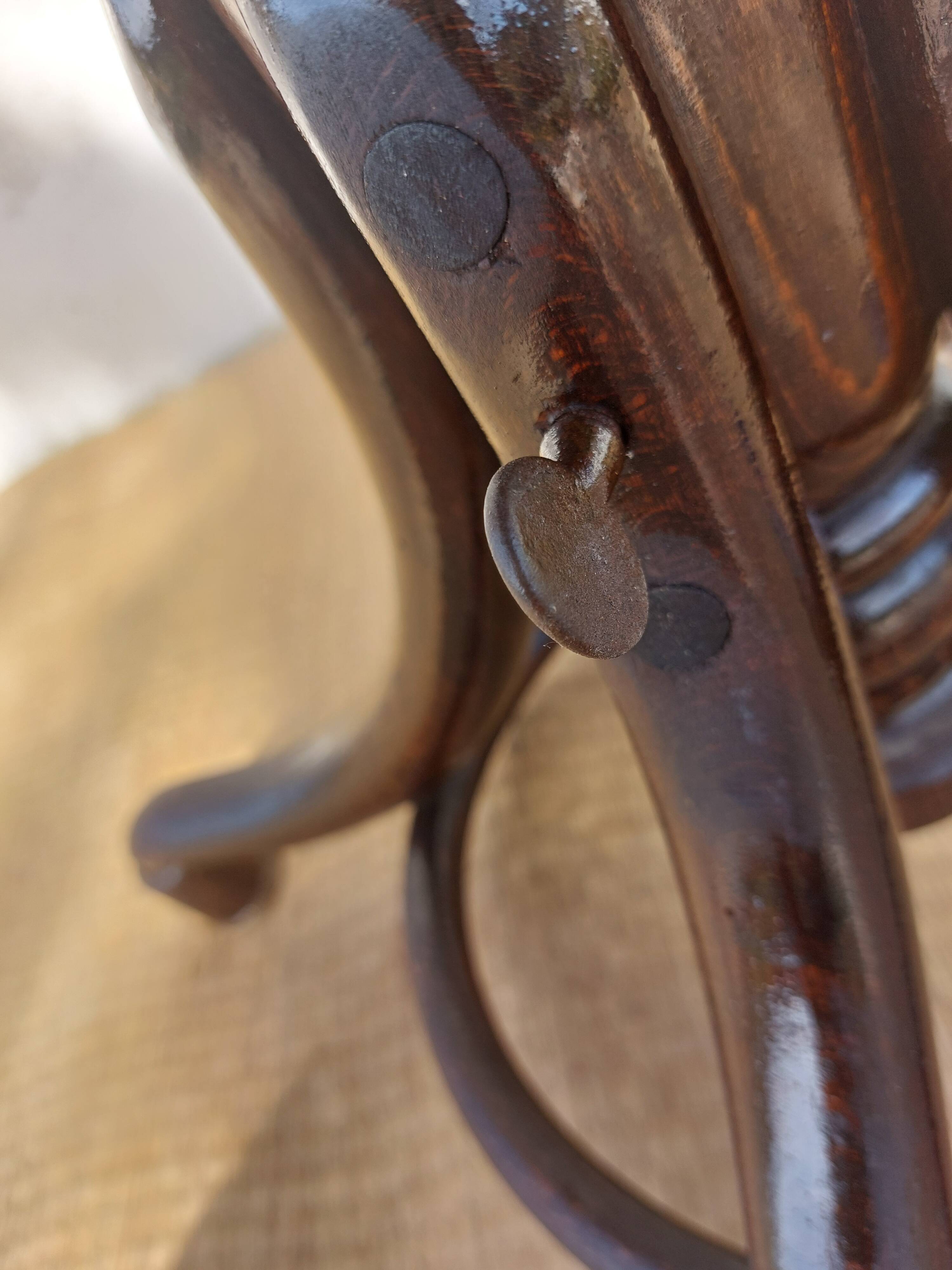 Swivel wooden armchair, pattern on seat