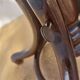 Swivel wooden armchair, pattern on seat