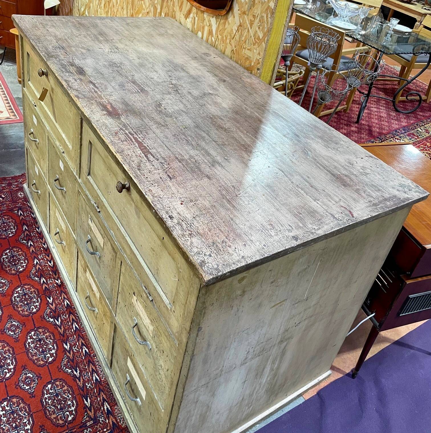 Old workshop furniture in good condition. 8 drawers and 2 drop-down doors, very