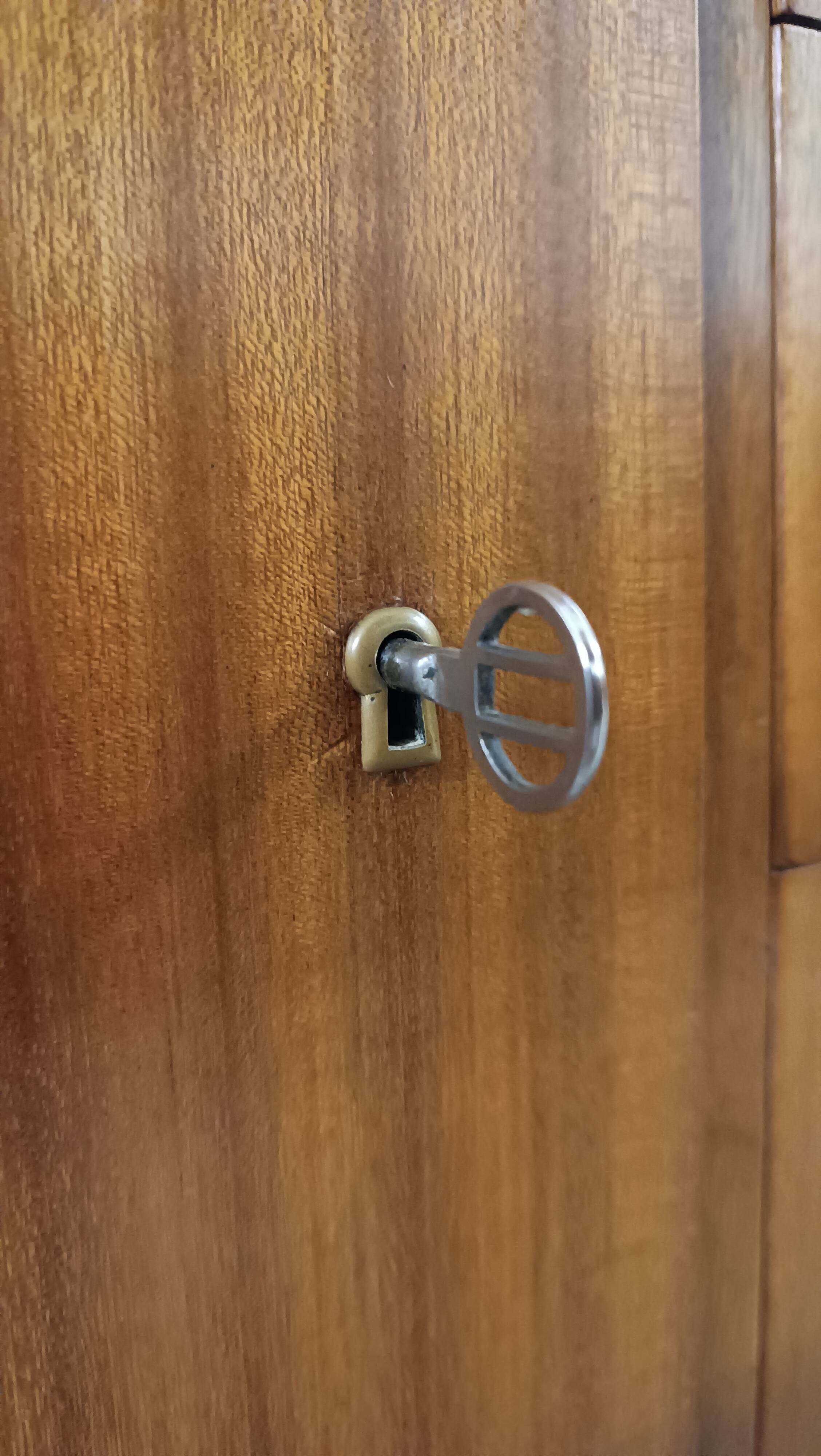 Scandinavian high sideboard with central drawers