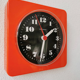 Vintage orange wall clock made of Inproco plastic, 1970