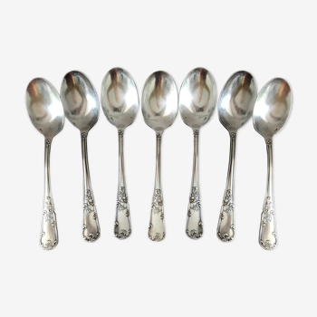 Set of 7 tablespoons in flowered silver metal with punch