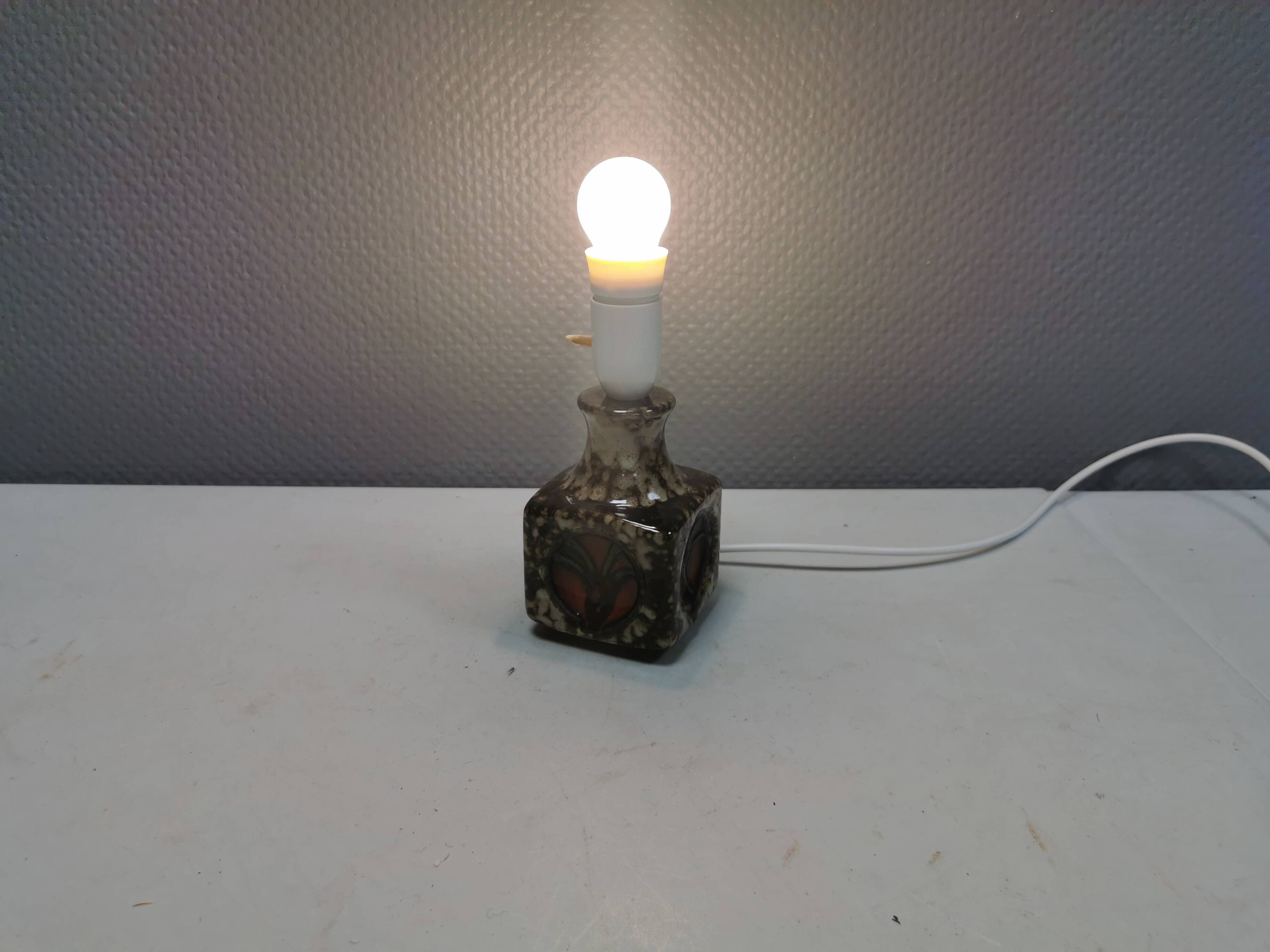 Small delicious ceramic table lamp, Danish and estimated from the 1970s.