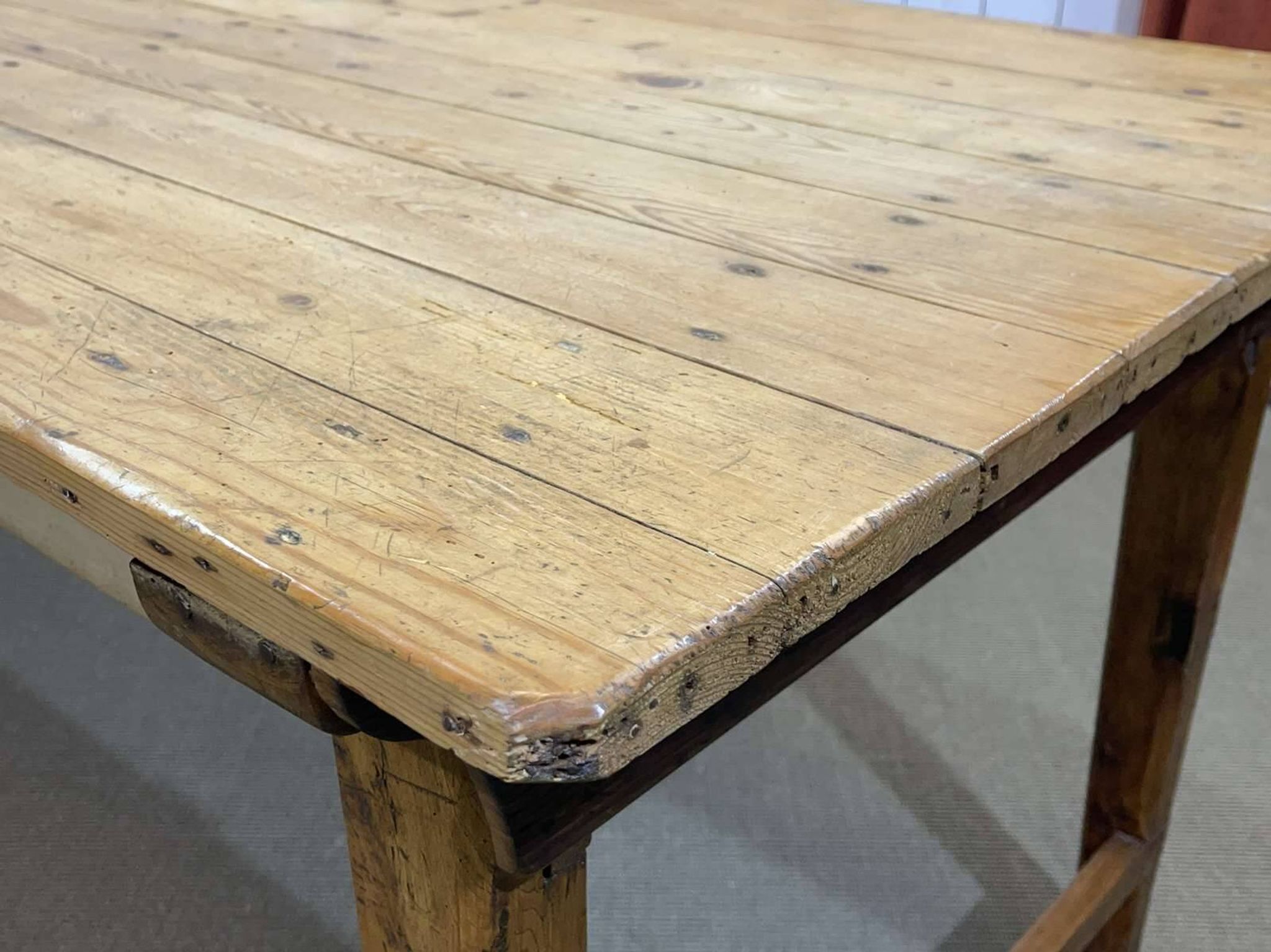 Early 20th-century farmhouse table made of fir, elm, and chestnut.