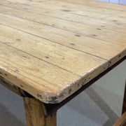 Early 20th-century farmhouse table made of fir, elm, and chestnut.