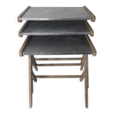 Wooden and zinc nesting tables