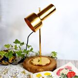 Adjustable lamp in gilded metal wooden base