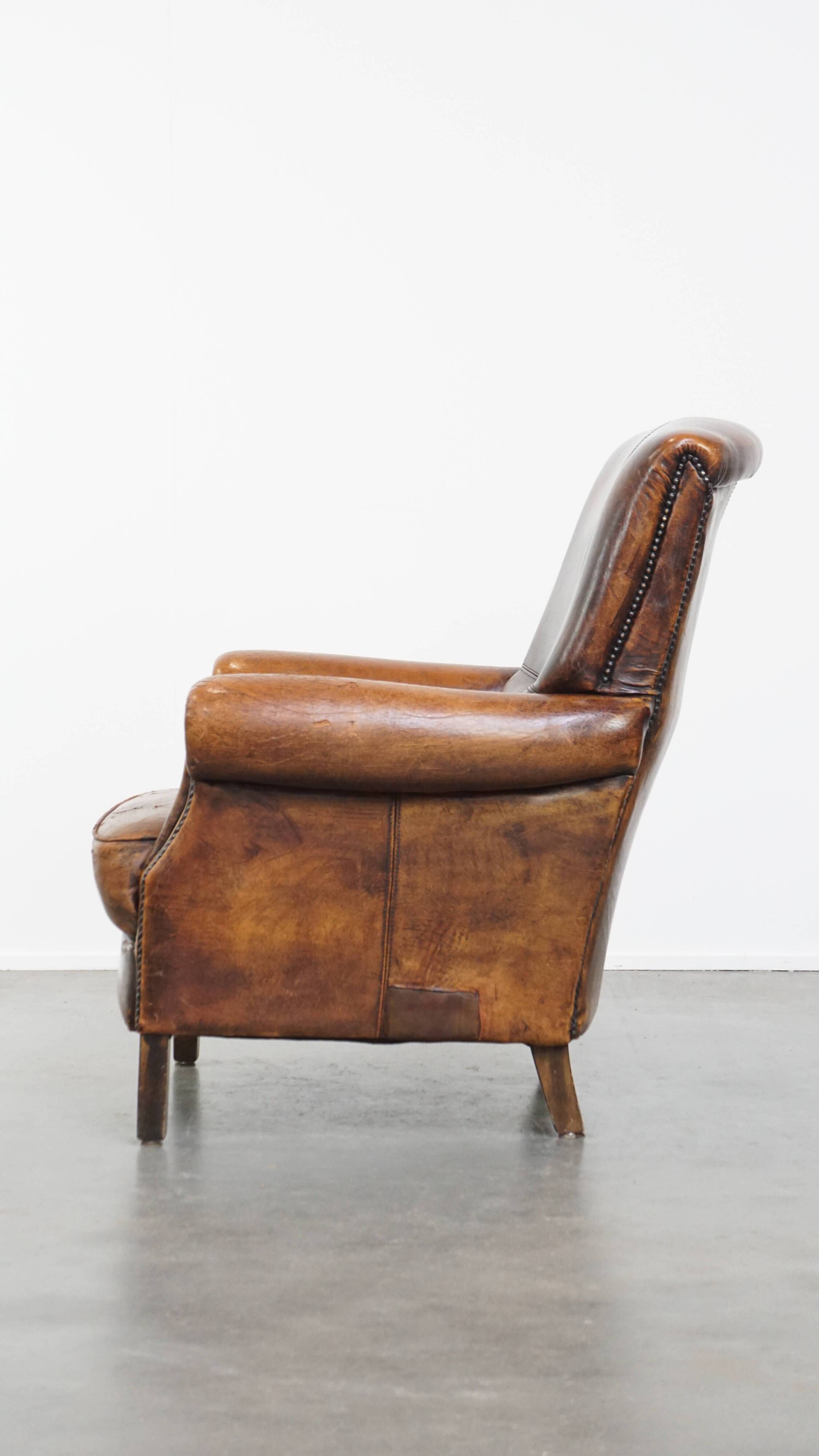 Fauteuil vintage en cuir de mouton avec dossier haut