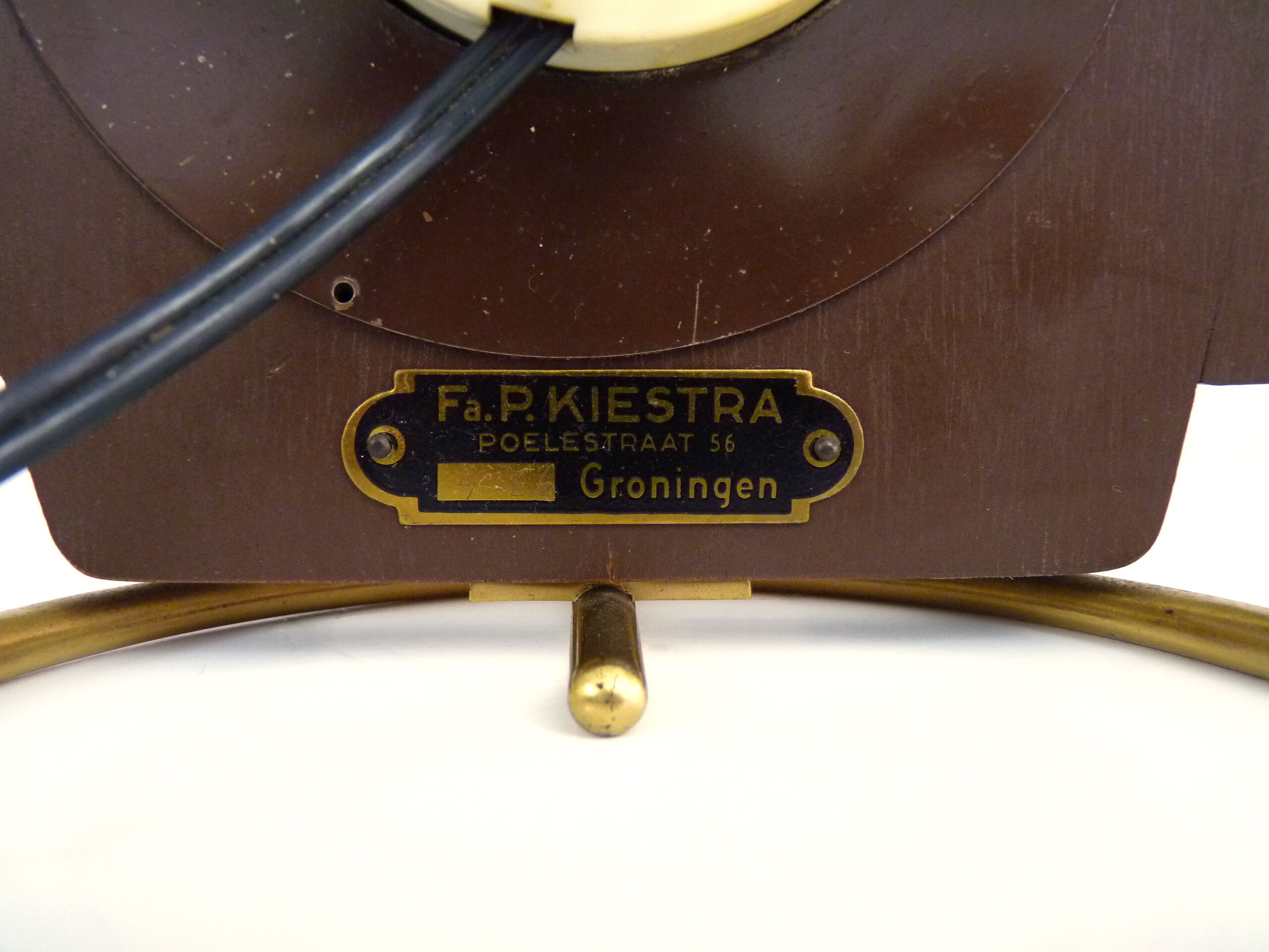 Table clock, art deco clock in Wuba Amsterdam in wood and brass. Year 50
