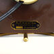 Table clock, art deco clock in Wuba Amsterdam in wood and brass. Year 50