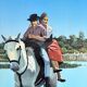 River crossing on horseback, on a sign by Campana.