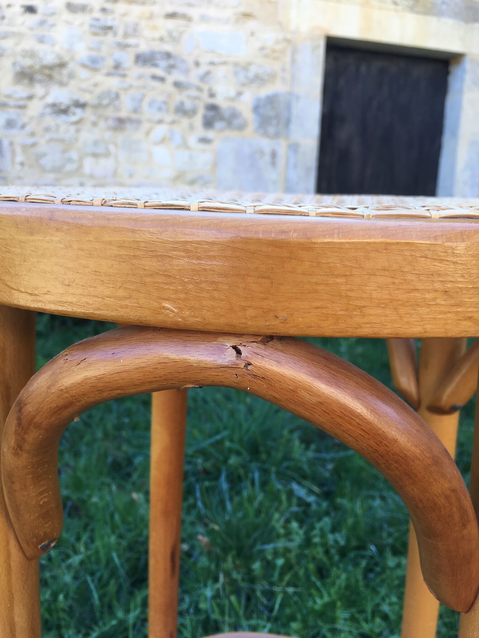 Cane bar and curved wood