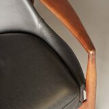 Fauteuil Seal en cuir et teck Ib Kofod-Larsen pour OPE, Suède, années 1960.