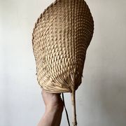 Woven rattan wall light in the style of Igno Maurer, design from the 1970s.