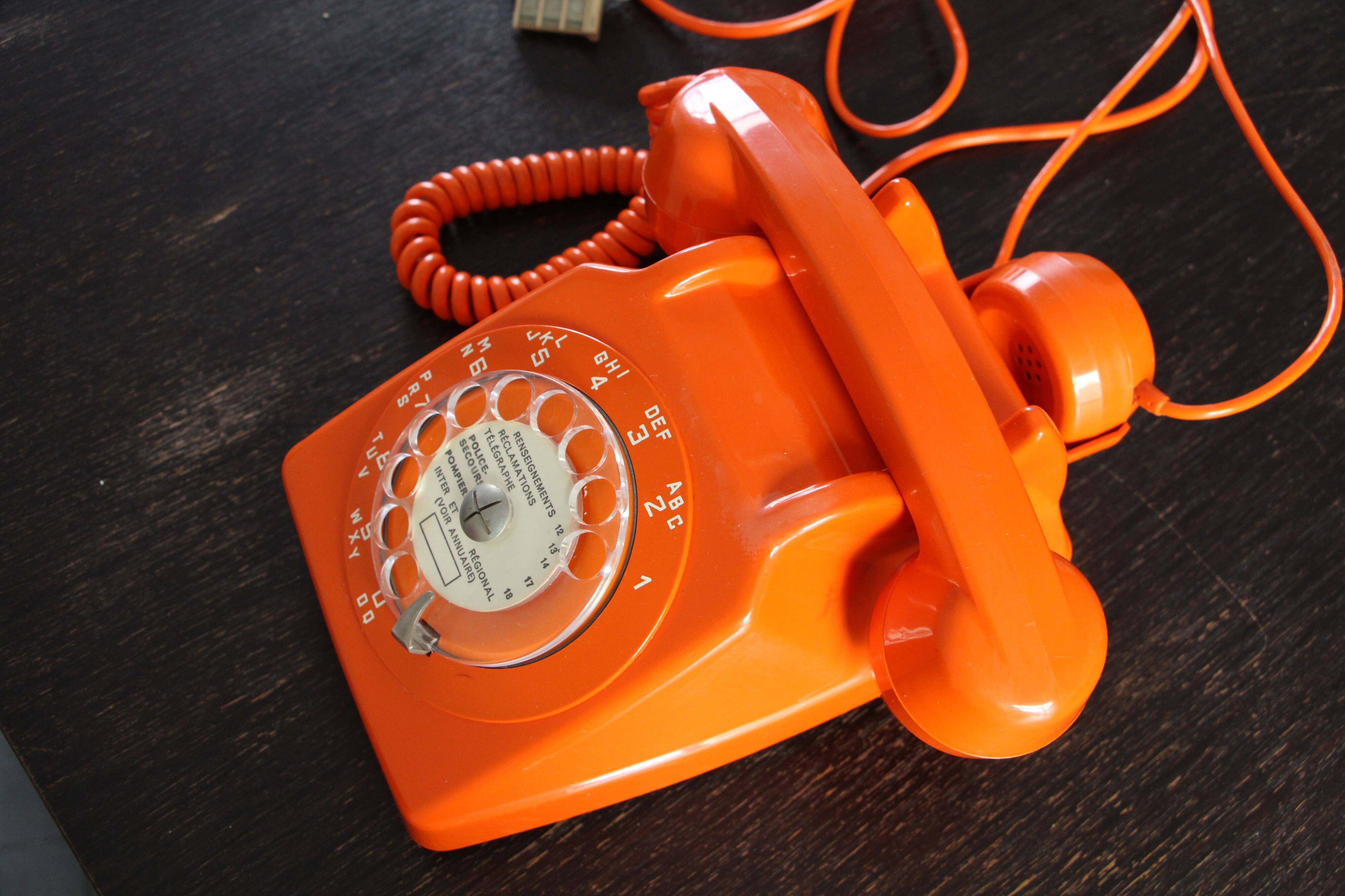 Vintage phone with orange dial 70's
