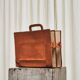 Trompe-l'Oeil magazine rack 'Actentasche' in patinated leather and canvas