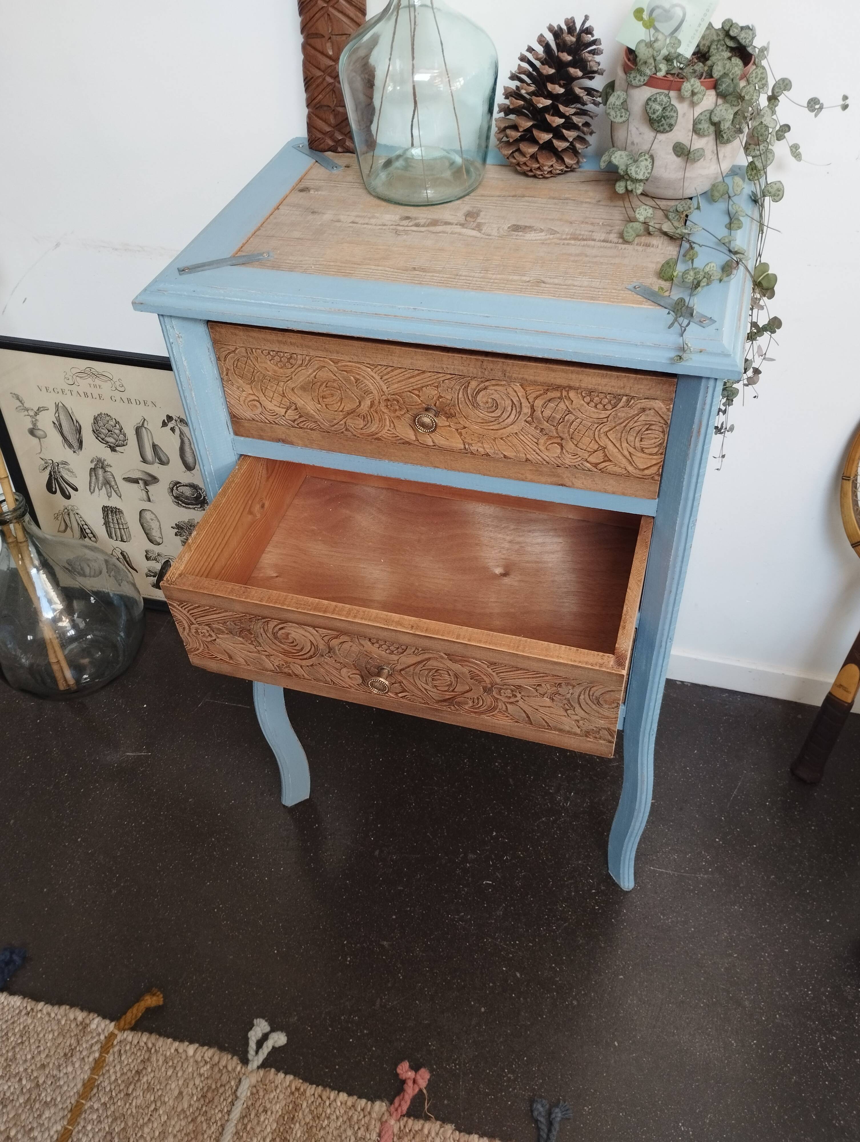 Small carved wood chest of drawers