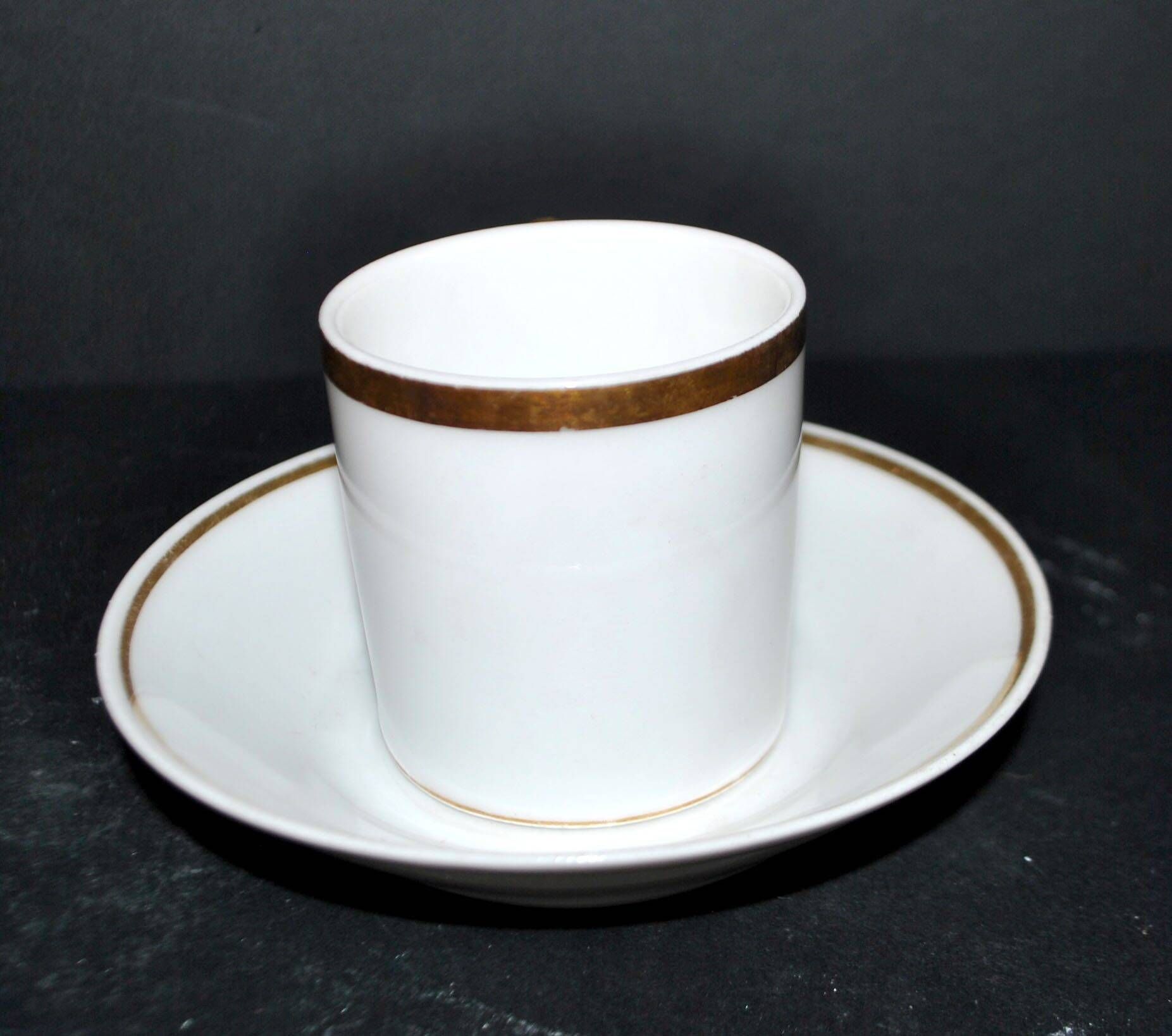Charles Hebert Rouen porcelain – Antique litron coffee cup with gold trim.