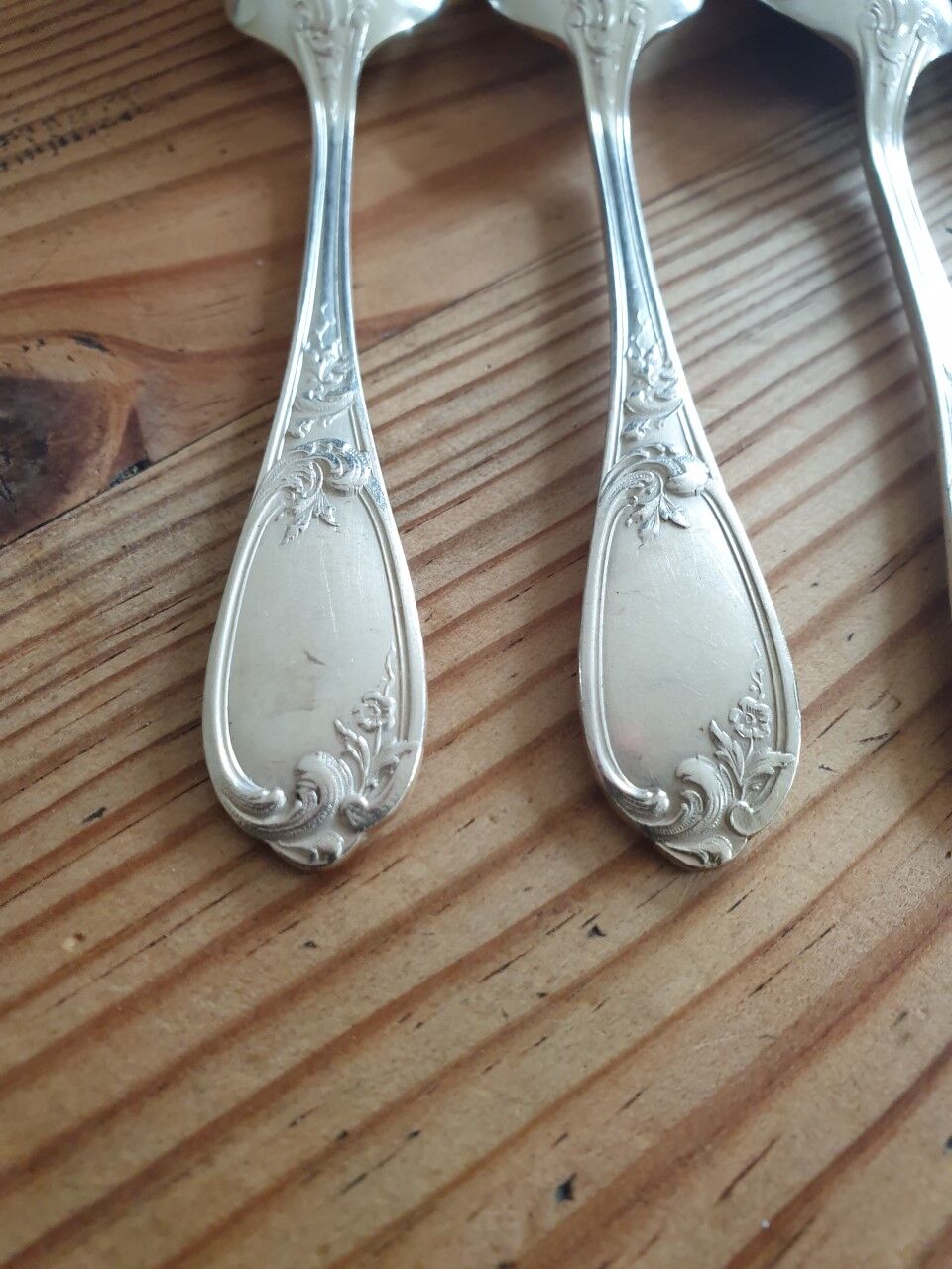 Small old silver metal spoons