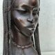 Large wooden bust of an African woman.