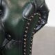 Elegant green English chesterfield office chair made of cowhide leather