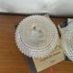 Large pair of round wall sconces ceiling lights in transparent glass.