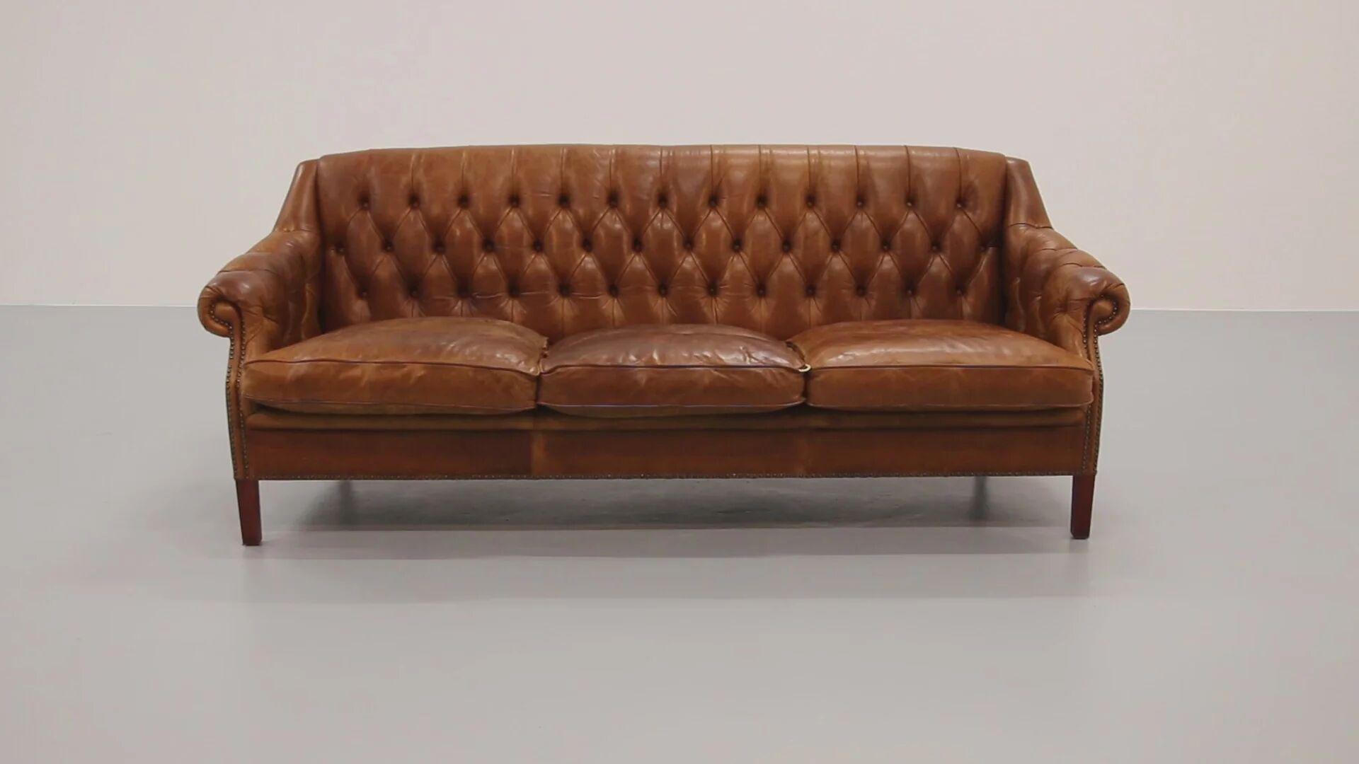 Canapé Chesterfield en cuir vieilli