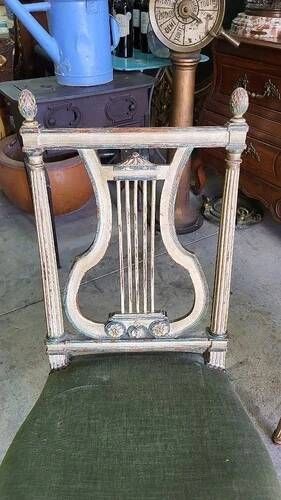Pair of Louis XVI style chairs from the 18th century with lyre back.
