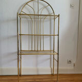 Gilded metal grid shelf in the shape of a vaulted arch