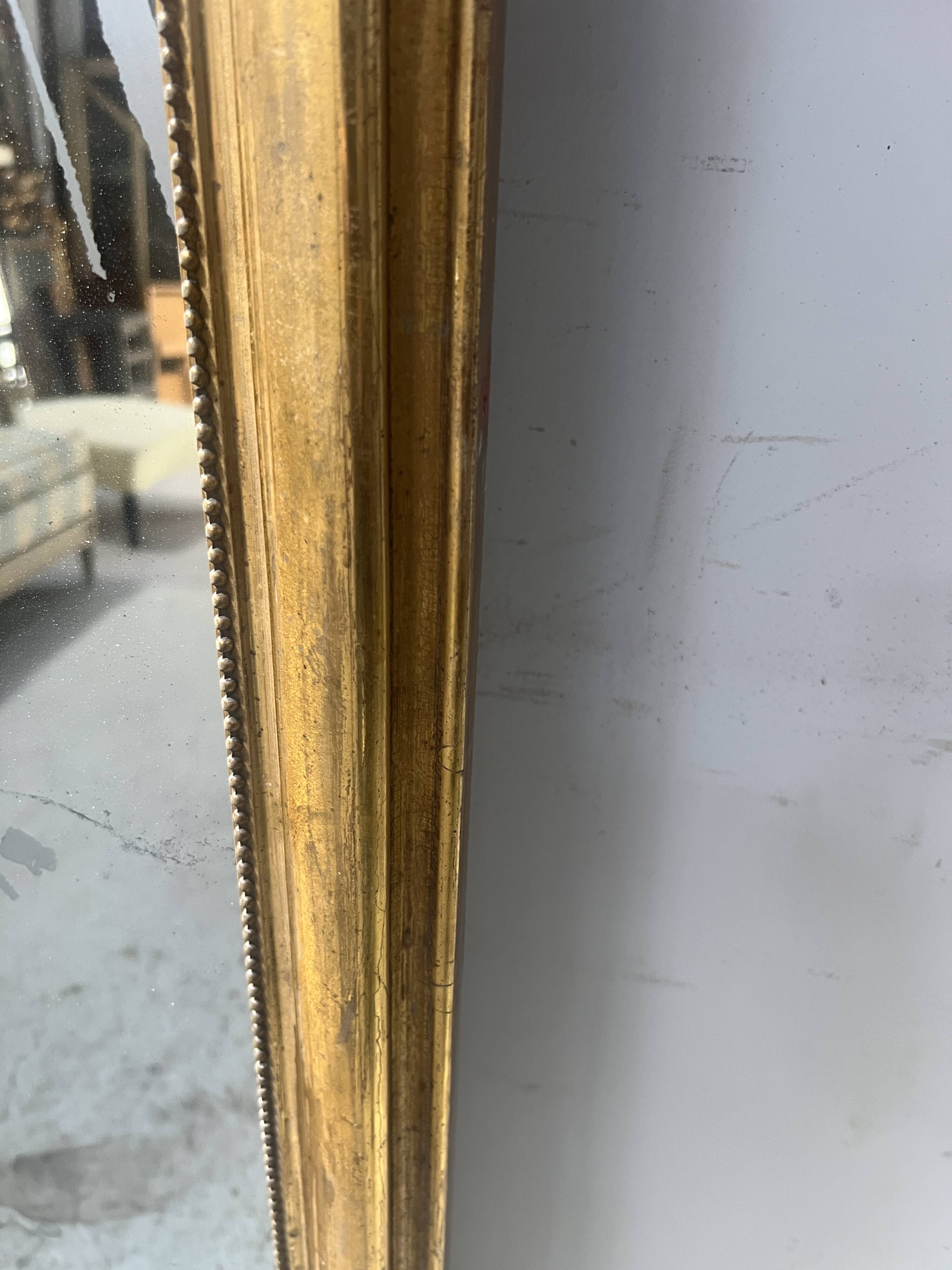 Louis XV style mirror in gilded wood and stucco