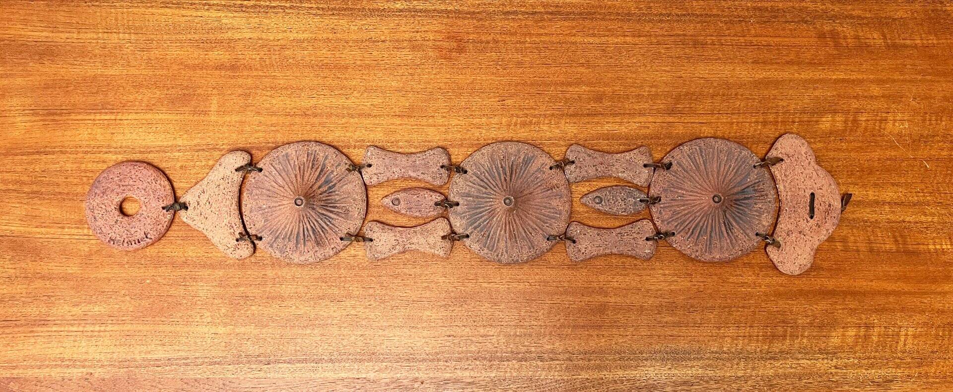 Wall suspension of Danish studio pottery in mid-century brutalist modernist style by Clara Helmich, 1979.