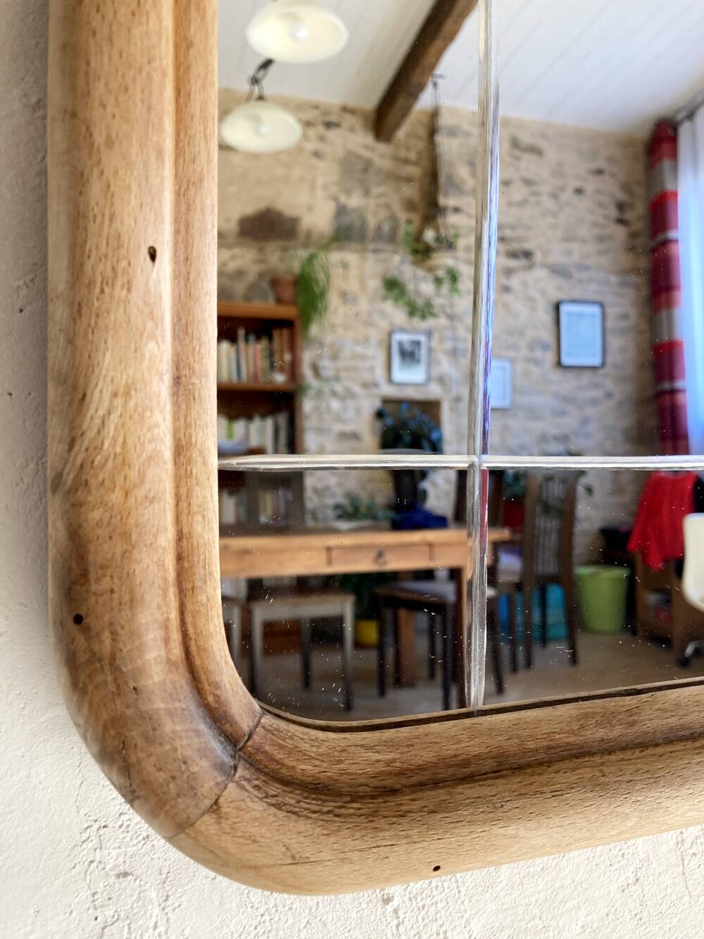 Art nouveau mirror, curved wooden frame and chiseled glass